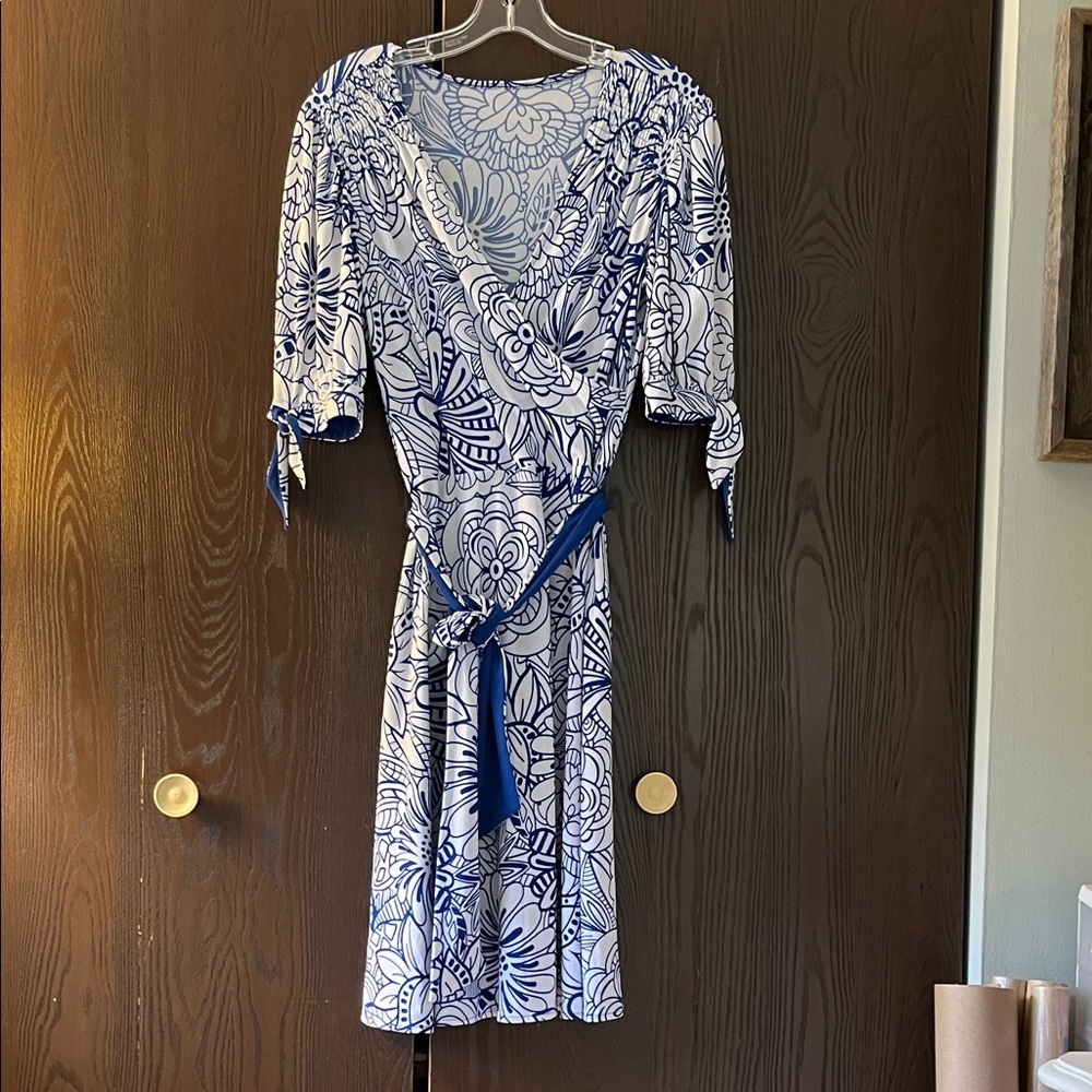 Brand Removed short sleeved, midi dress. White with blue floral. Size M